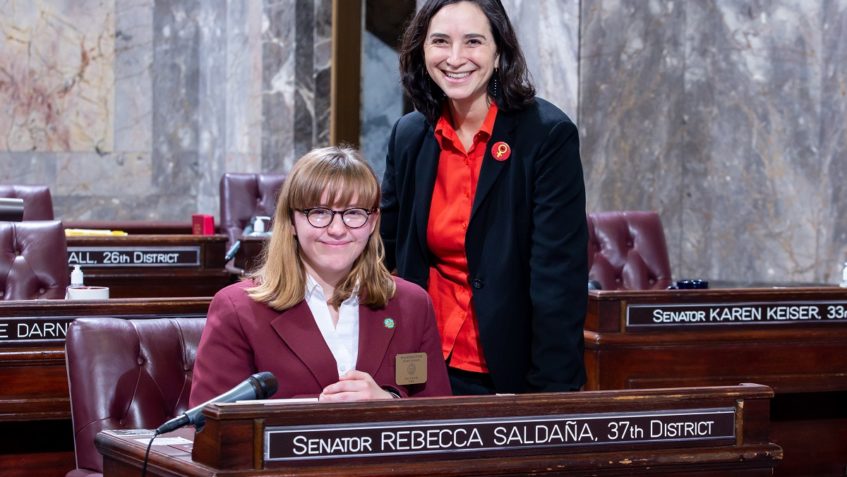 Sen. Saldaña with Senate Page Kai Craig, March 2, 2020.