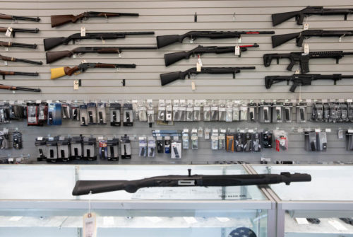 Guns for sale at Wade’s Eastside Guns in Bellevue on Monday, Aug. 22, 2022. New gun control regulations, including new rules for gun dealers and mandatory reporting of lost and stolen guns, have passed in the Washington state legislature. (Amanda Snyder/Cascade PBS)
