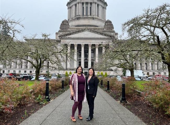 Sen. Dhingra and her new legislative assistant, Daisy, outside the Legislative Building.