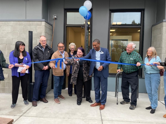 Community leaders celebrate the grand opening of Lotus Court in Olympia. 