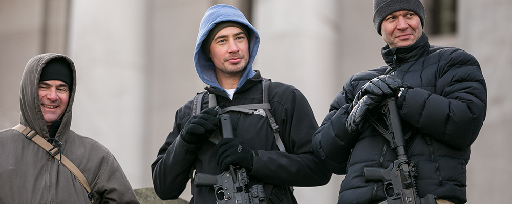 three men at an open carry firearms rally at the Washington State Capitol.