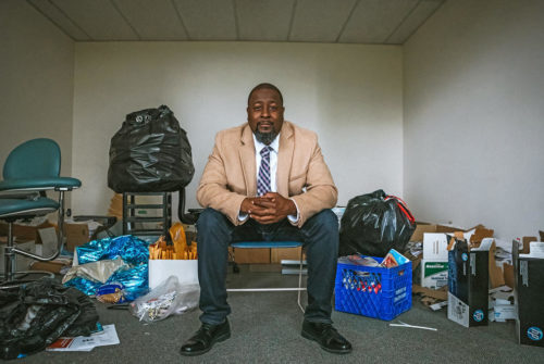 Drayton Jackson, executive director of the Foundation for Homeless and Poverty Management, is seen here surrounded by various items as he set up his new office space in early 2021. Jackson was homeless for two decades and now is an advocate for the unhoused, leading a state anti-poverty work group. (Courtesy of Drayton Jackson)