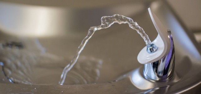 A photo of water coming out of a drinking fountain.